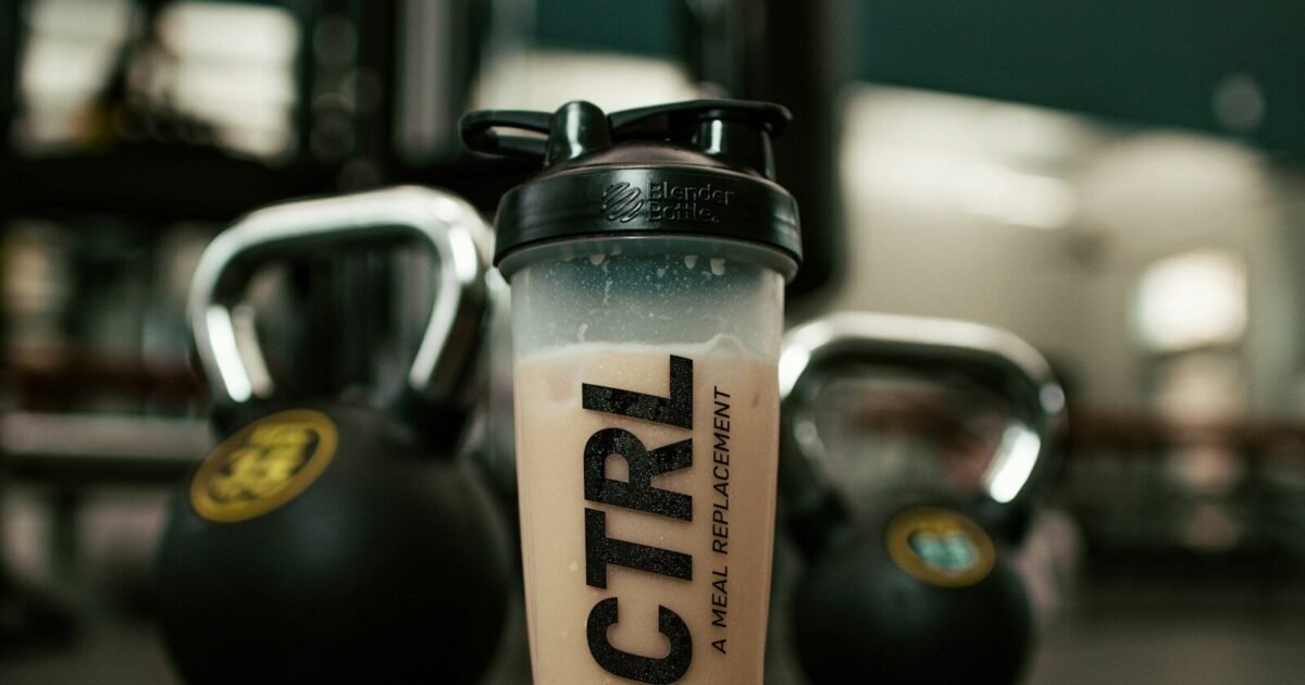 white and black plastic tumbler