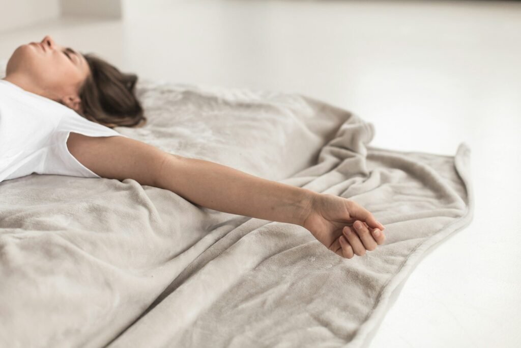 a person lying on a bed